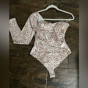 One sleeve bodysuit.